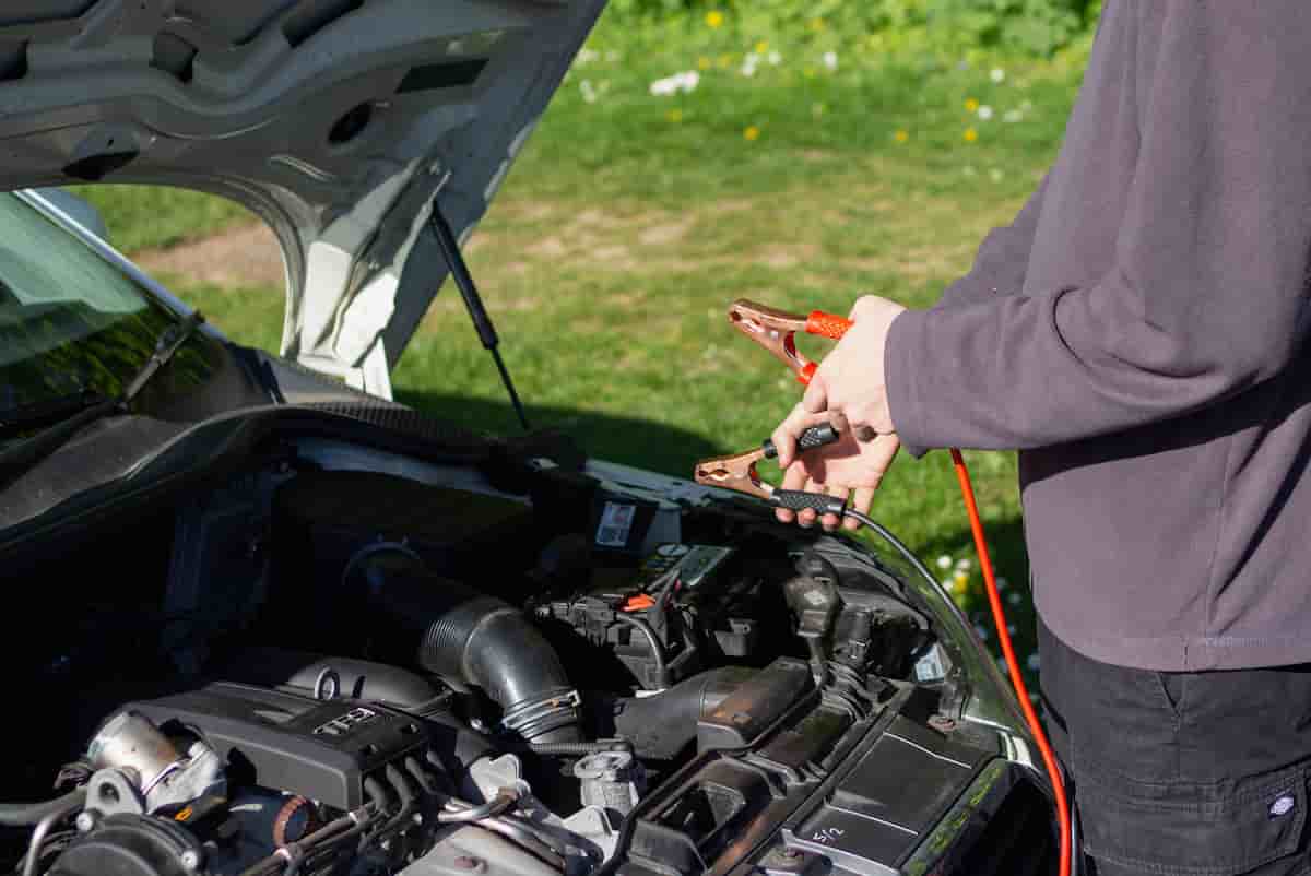 Mobile mechanic diagnosing a car that won't start in a Junction City Kansas driveway